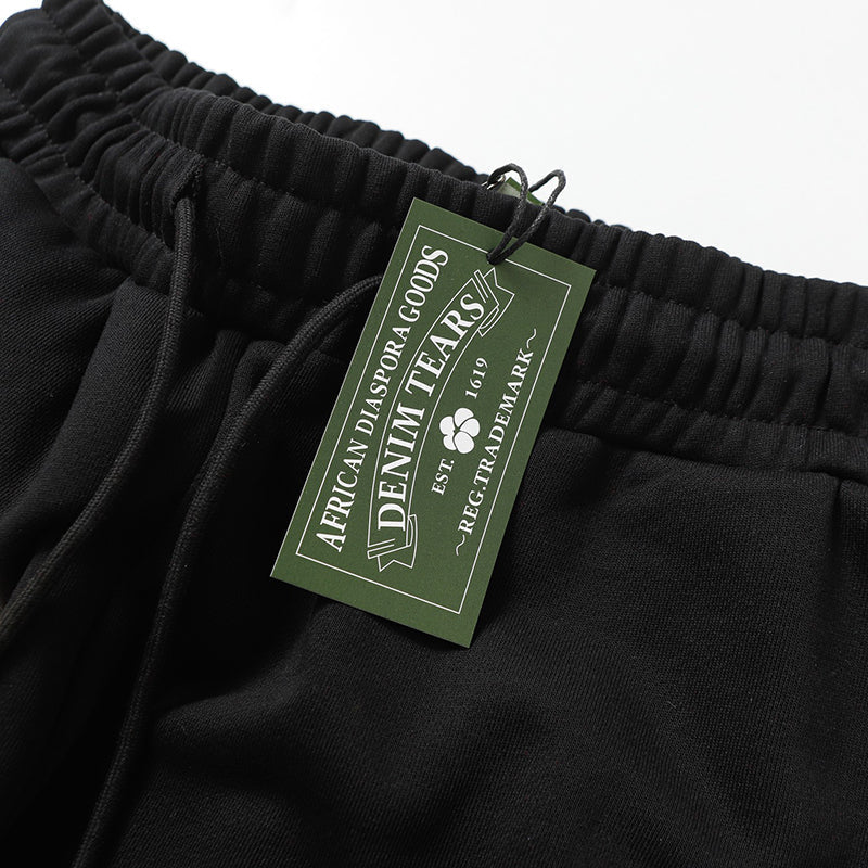 Denim Tears Kapok Pattern Printed Sweatpant DENIM TEARS