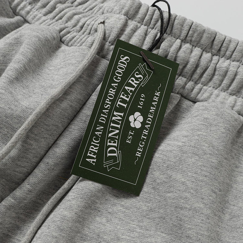 Denim Tears Kapok Pattern Printed Sweatpant DENIM TEARS