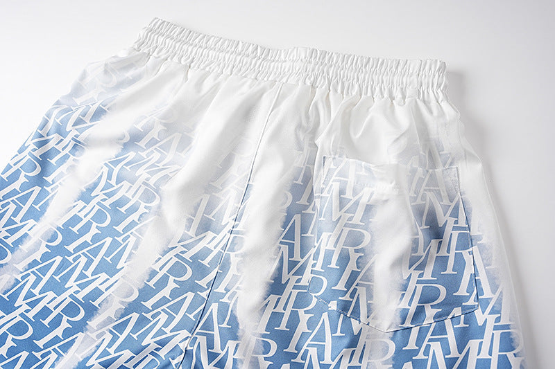 AMIRI logo-print gradient silk shorts AMIRI