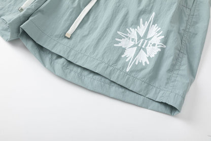 AMIRI Starburst logo shell swim shorts AMIRI